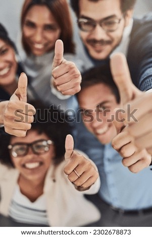Business people, hands and thumbs up above for winning, success or teamwork at the office. Top view of employee group showing hand or thumb emoji, yes sign or like in team win, victory or good job