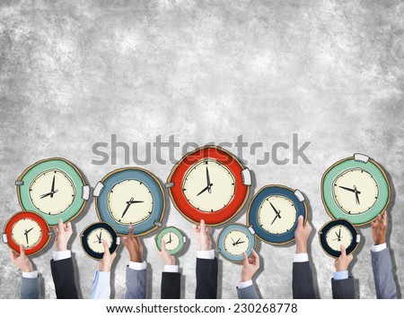 Group of Hands Holding Clock Royalty-Free Stock Photo #230268778