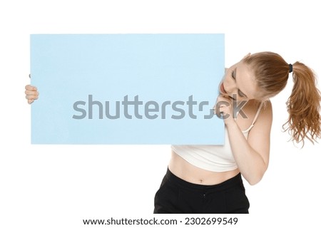Banner of young blonde woman feeling happiness and holding blue Empty white canvas frame for text or advertising isolated on white studio background