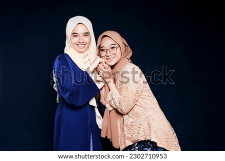 Beautiful business woman with hijab portrait on color background