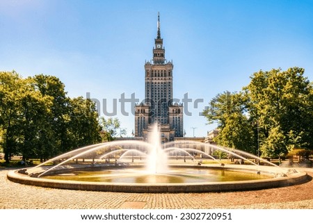 Palace of Culture and Science with Fountain during a Sunny Day in Warsaw, Poland   Royalty-Free Stock Photo #2302720951
