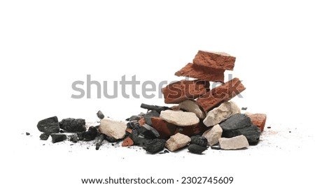 Burned and demolished, charcoal, stone and broken pieces red tiles isolated on white, side view