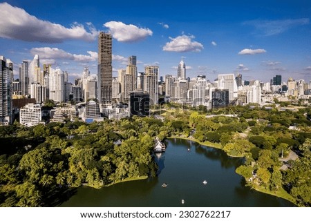 Aerial Drone Panorama Over Lumpini Park In Central Bangkok, Thailand.