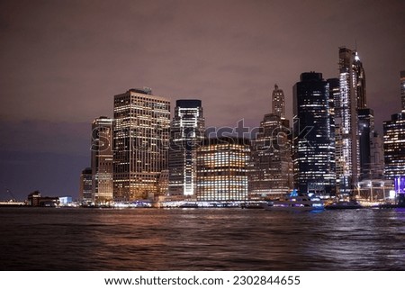 panorama of Manhattan and financial district across the East River from Brooklyn