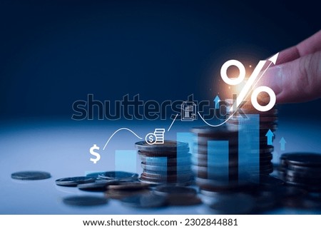 Interest rate and dividend concept. Businessman with percentage symbol and up arrow, Interest rates continue to increase, return on stocks and mutual funds, long term investment for retirement. Royalty-Free Stock Photo #2302844881