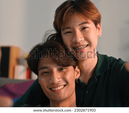 Two Young gay couple male take a selfie with love moment, LGBT couple love moments happiness concept.