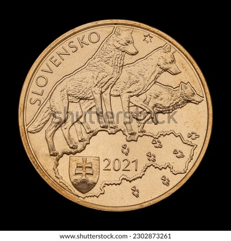 The commemorative euro coin from Slovakia on the black background