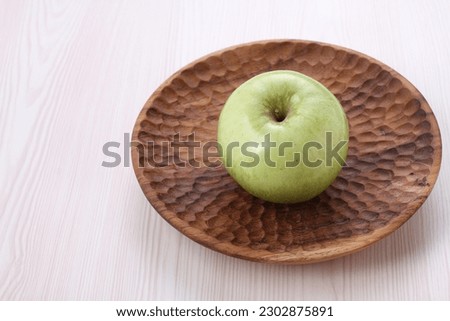 fresh green apple on the table