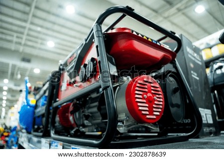 Portable diesel generator AC at the showroom of a large store. Royalty-Free Stock Photo #2302878639
