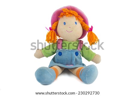 stuffed soft sitting funny pig-tailed red-headed doll isolated over white  Royalty-Free Stock Photo #230292730