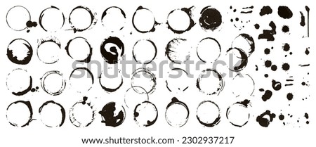 Black coffee rings, grunge circle frames or stamp graphic elements. Stains and drops, isolated decorative design. Neoteric decor vector clipart Royalty-Free Stock Photo #2302937217