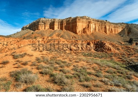 Sandstone cliffs and rock formations at Canon Rojo de Teruel in the Aragon region of Spain Royalty-Free Stock Photo #2302956671