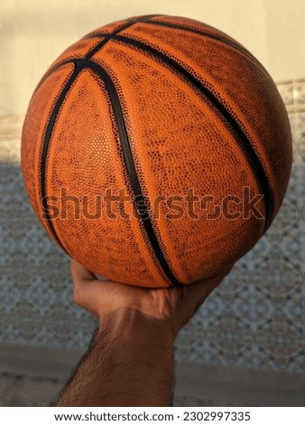 Pictures of some individual and team sports, football and basketball.