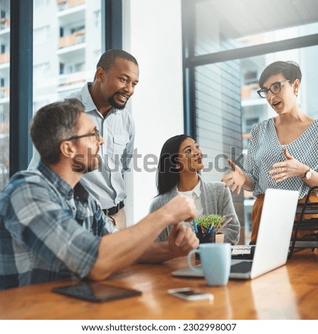 Teamwork, laptop and idea with business people in meeting for project management, review or planning. Technology, website and training with group of employees in office for collaboration and coaching Royalty-Free Stock Photo #2302998007