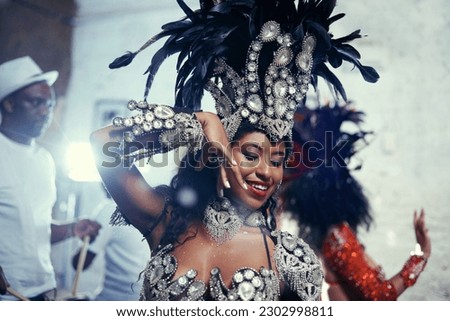 Festival, carnival and dancer woman in samba with smile, music and party celebration in Brazil. Mardi gras, dancing or culture event costume with a young female person with happiness from performance