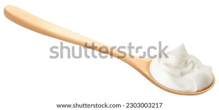 sour cream on wooden spoon, mayonnaise, yogurt, isolated on white background, clipping path, full depth of field Royalty-Free Stock Photo #2303003217