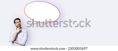 Attractive young european businesswoman with speech bubble on wide white background. Opinion, speech and communication concept. Mock up place