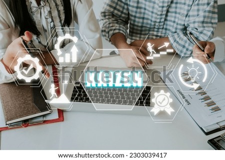 KAIZEN concept, Business person team working on analyzing financial data with kaizen icon on virtual screen, Business philosophy and corporate strategy concept of continual Royalty-Free Stock Photo #2303039417
