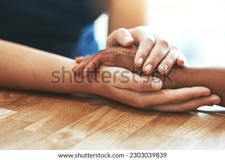 Support, care and together with people holding hands for hope, trust and empathy. Diversity, forgive and friends with helping hand, respect and help through cancer grief or consoling with connection Royalty-Free Stock Photo #2303039839