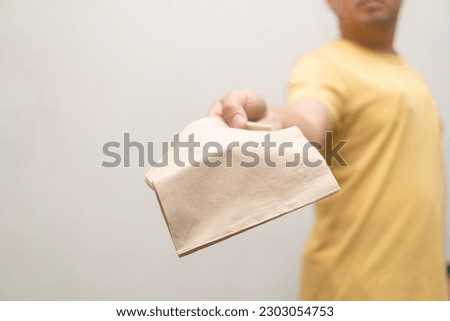 Please use Brown Recycled Bar Napkin. Tissue paper recycle. beige paper napkin. Royalty-Free Stock Photo #2303054753