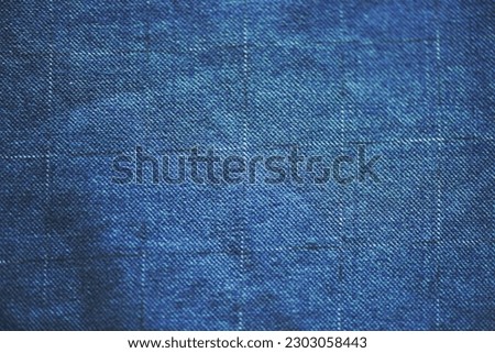 Blue jeans fabric background texture. Jeans blue backdrop patterns.