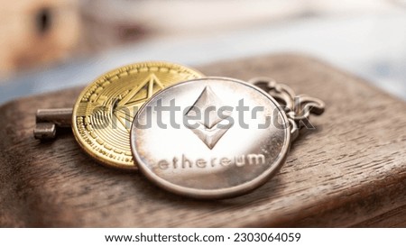 Key and digital money (ETH) Ethereum coin  In the ground. Cryptocurrency digital Concept   Royalty-Free Stock Photo #2303064059