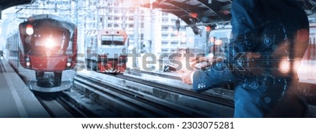 Engineer manager use tablets and AI systems. Inspect and control the operation of the sky train Royalty-Free Stock Photo #2303075281