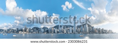 Panorama of skyline of Victoria Harbor in Hong Kong city Royalty-Free Stock Photo #2303086231