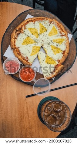 pizza and japanese iced coffe