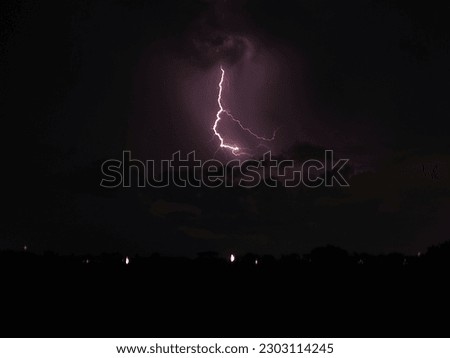 Lightning flashes and rumbling sounds in the sky at night, natural phenomena that appear before heavy rains