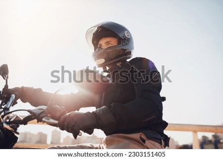 Motorcycle, travel and journey with man in city for freedom, driving and vintage. Relax, driver and leather with male biker on motorbike in outdoors for transportation, vintage and biking trip Royalty-Free Stock Photo #2303151405