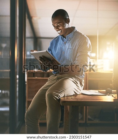 Business, smile and black man with a tablet, typing and online reading with software, modern office and happiness. Male person, employee or entrepreneur with technology, connection and communication Royalty-Free Stock Photo #2303151547
