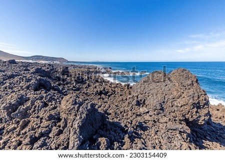 Picture over volcanic coast near El Golfo on Lanzarote during daytime