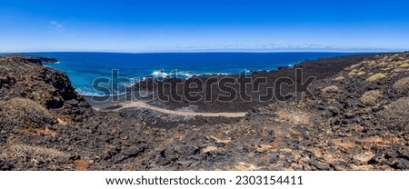Panoramic picture over the black beach Playa del Paso near El Golfo on Lanzarote during daytime