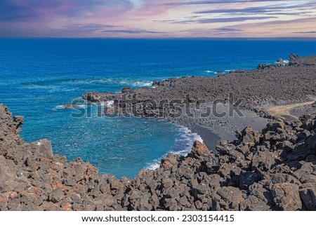 Picture over the black beach Playa del Paso near El Golfo on Lanzarote during daytime
