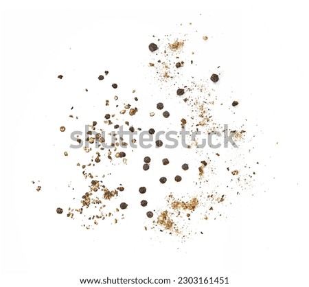 ground black peppers and full black peppers isolated on white background Indian spices  Royalty-Free Stock Photo #2303161451