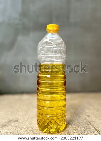 cooking oil portrait photo with simple background