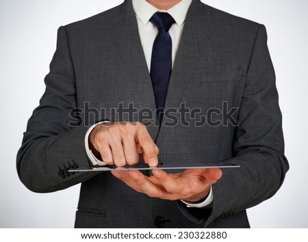 Futuristic digital tablet in the hands