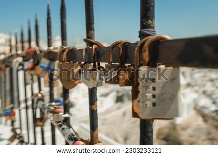 Locks attached to a fence where couples locked them