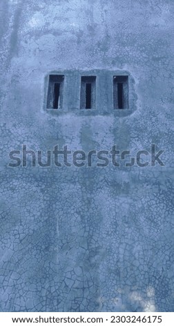 Abstract patterned cement wall, patterned walls, house ventilation.