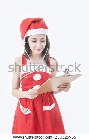 Doctor with stethoscope endorses Christmas on a white 