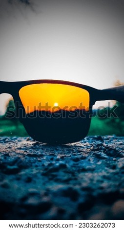 amazing picture of sunset through the eyes of sunglass. beautiful capture for you guys.