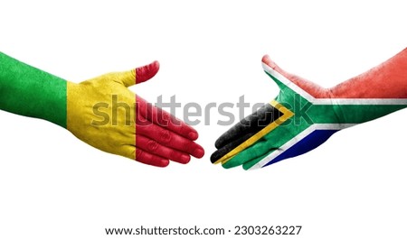 Handshake between Mali and South Africa flags painted on hands, isolated transparent image.