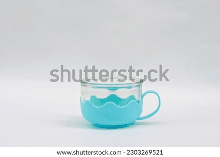 unique glass cup isolated on white background.