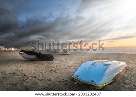 Fishing boats on the beach.