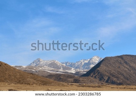beautiful view of the mountain valley, snow-covered mountains