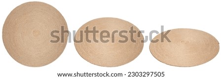 Circle rug made with jute rope in 3 different angles isolated on white background Royalty-Free Stock Photo #2303297505