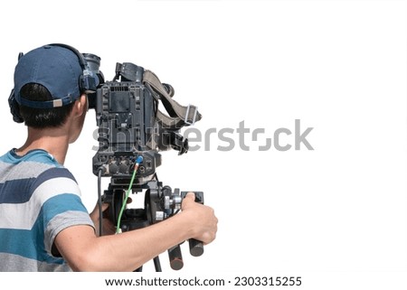 Operator works with a video camera. Video camera for reporzhny filming in the media.  On a white background.