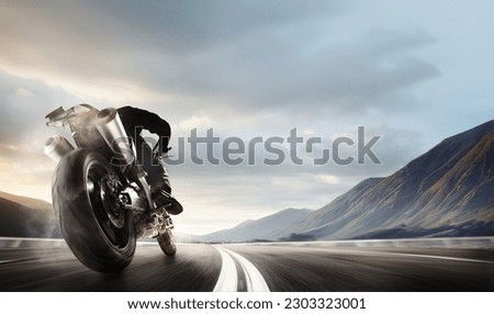 Back bottom view image of man, professional motorbike rider on road, riding with high speed around mountains. 3D render background. Concept of motosport, speed, leisure, hobby, active lifestyle Royalty-Free Stock Photo #2303323001