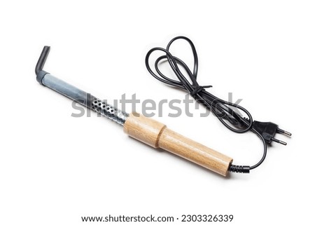 Soldering iron with wooden handle isolated on white background Royalty-Free Stock Photo #2303326339